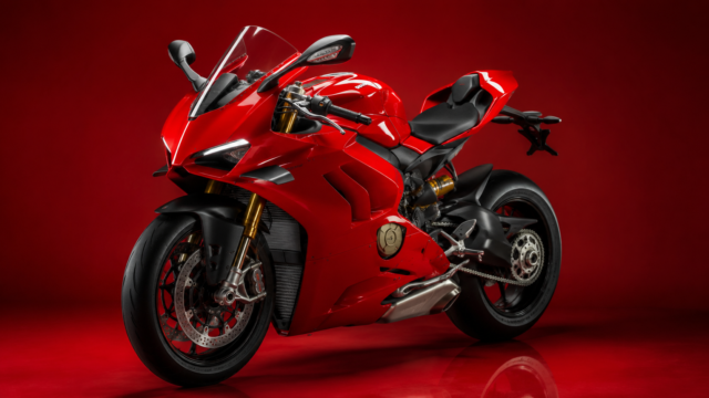 Red Ducati Sportbike on Red Background Wallpaper 4K 3840x2160 - Free Download